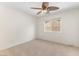 Bedroom with ceiling fan and window at 8229 Flowing Rapids Ct, Las Vegas, NV 89131