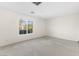 Bright bedroom with window and wall-to-wall carpet at 8229 Flowing Rapids Ct, Las Vegas, NV 89131