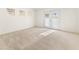 Bright bedroom with carpet flooring and access to backyard at 8229 Flowing Rapids Ct, Las Vegas, NV 89131