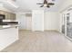 Kitchen and dining area with tile floors at 8229 Flowing Rapids Ct, Las Vegas, NV 89131