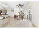 Light and airy dining area featuring modern furnishings and a sliding glass door at 8229 Flowing Rapids Ct, Las Vegas, NV 89131