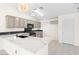 Modern kitchen with white cabinets and quartz countertops at 8229 Flowing Rapids Ct, Las Vegas, NV 89131