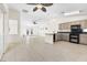 Open kitchen with island and breakfast bar at 8229 Flowing Rapids Ct, Las Vegas, NV 89131