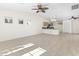 Open concept living room and kitchen with tile flooring at 8229 Flowing Rapids Ct, Las Vegas, NV 89131