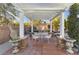 Outdoor patio with pergola, seating area, and built-in grill at 8229 Flowing Rapids Ct, Las Vegas, NV 89131