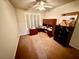 Spacious bedroom with desk and file cabinet at 10008 Rolling Glen Ct, Las Vegas, NV 89117