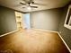 Bright bedroom with ceiling fan and access to closet at 10008 Rolling Glen Ct, Las Vegas, NV 89117