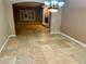 Bright dining room with tile floors, fireplace, and large windows at 10008 Rolling Glen Ct, Las Vegas, NV 89117