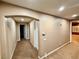 Bright hallway with neutral-toned walls and carpet at 10008 Rolling Glen Ct, Las Vegas, NV 89117