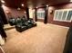 Home theater with large screen and comfortable seating at 10008 Rolling Glen Ct, Las Vegas, NV 89117