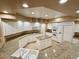 Spacious kitchen with granite counters and white cabinets at 10008 Rolling Glen Ct, Las Vegas, NV 89117