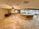 Open living area with tile floors and a view into the kitchen at 10008 Rolling Glen Ct, Las Vegas, NV 89117