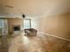 Large living room with fireplace and tile floors at 10008 Rolling Glen Ct, Las Vegas, NV 89117