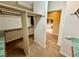 Large walk-in closet with double rods and shelving at 10008 Rolling Glen Ct, Las Vegas, NV 89117