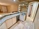 Wet bar with granite countertop and wine cooler at 10008 Rolling Glen Ct, Las Vegas, NV 89117