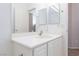 Bathroom with a single sink vanity and mirrored medicine cabinet at 10168 Maidens Wreath Ct, Las Vegas, NV 89183