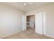 Spacious bedroom with double doors leading to another room at 10168 Maidens Wreath Ct, Las Vegas, NV 89183