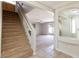 Staircase with carpet runner and view into the living room at 10168 Maidens Wreath Ct, Las Vegas, NV 89183