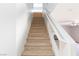 Beige carpeted stairs leading to the upper level of the home at 10168 Maidens Wreath Ct, Las Vegas, NV 89183