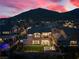 Aerial view of a two-story home with a landscaped backyard and mountain views at 11250 Torch Cactus Dr, Las Vegas, NV 89138