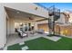 Covered patio with seating area and spiral staircase leading to upper level at 11250 Torch Cactus Dr, Las Vegas, NV 89138