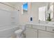 Clean bathroom with a shower/tub combo and vanity at 11250 Torch Cactus Dr, Las Vegas, NV 89138