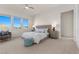 Bright bedroom with mountain views, king-size bed, and ample natural light at 11250 Torch Cactus Dr, Las Vegas, NV 89138