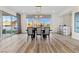 Bright dining room with hardwood floors and a view at 11250 Torch Cactus Dr, Las Vegas, NV 89138