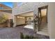 Private courtyard with gated entrance and stone exterior at 11250 Torch Cactus Dr, Las Vegas, NV 89138