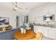 Charming kitchenette with white cabinetry and granite countertops at 11250 Torch Cactus Dr, Las Vegas, NV 89138