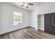 Bright bedroom with large window and built-in shelving at 1516 Via Salaria Ct, Henderson, NV 89052