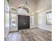 Grand entryway with high ceilings, arched window, and double doors at 1516 Via Salaria Ct, Henderson, NV 89052