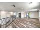 Spacious loft area with hardwood floors and balcony at 1516 Via Salaria Ct, Henderson, NV 89052