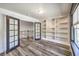 Home office with built-in shelving and French doors at 1516 Via Salaria Ct, Henderson, NV 89052