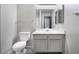 Clean bathroom with gray vanity and updated fixtures at 1865 Apricot Ct, Henderson, NV 89014