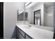 Neat bathroom with a vanity and large mirror at 1865 Apricot Ct, Henderson, NV 89014