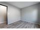 Simple bedroom with grey walls and laminate floors at 1865 Apricot Ct, Henderson, NV 89014