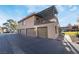 Exterior view of building with garages and balconies at 1865 Apricot Ct, Henderson, NV 89014