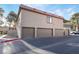 Exterior view of building with multiple garages at 1865 Apricot Ct, Henderson, NV 89014