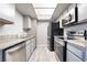 Modern kitchen featuring stainless steel appliances and granite countertops at 1865 Apricot Ct, Henderson, NV 89014