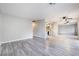 Open concept living and dining area with gray flooring at 1865 Apricot Ct, Henderson, NV 89014