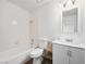 Updated bathroom featuring a shower and tub, tile, modern vanity and a sink at 2214 Pebble Creek Ln, Laughlin, NV 89029