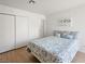 Cozy bedroom featuring wood floors, closet and natural light at 2214 Pebble Creek Ln, Laughlin, NV 89029