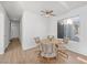 Bright dining area with wood floors, contemporary furniture, and natural light at 2214 Pebble Creek Ln, Laughlin, NV 89029