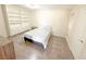 Cozy bedroom with built-in shelves and hardwood floors at 2831 Geary Pl # 2921, Las Vegas, NV 89109