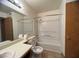 Clean bathroom with shower/tub combo and tile floors at 2961 Juniper Hills Blvd # 102, Las Vegas, NV 89142