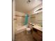 Bathroom with tub, toilet and vanity at 2961 Juniper Hills Blvd # 102, Las Vegas, NV 89142