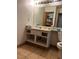 Bathroom with a vanity, toilet, and a mirror at 2961 Juniper Hills Blvd # 102, Las Vegas, NV 89142