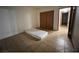 Simple bedroom with tile floors and a mattress at 2961 Juniper Hills Blvd # 102, Las Vegas, NV 89142