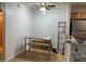 Simple dining area featuring tile floors and a metal table at 2961 Juniper Hills Blvd # 102, Las Vegas, NV 89142